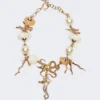 ”abissi” chokerhalsband i metall och raffia, guld ”abissi” chokerhalsband i metall och raffia, guld