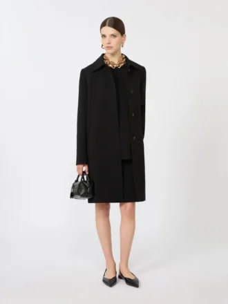 Blus i cady med rund hals, svart