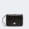 Clutch i slätt läder, svart Clutch i slätt läder, svart