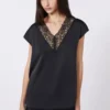 Feminin satintopp, svart
