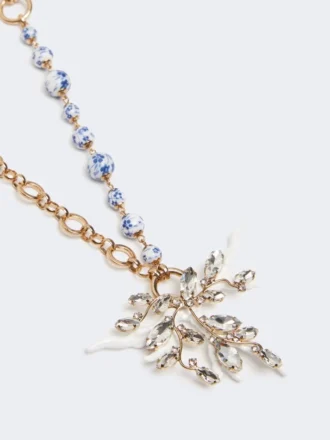 Halsband med kedjor i metall och keramik, guld Halsband med kedjor i metall och keramik, guld