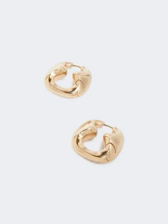 Iögonfallande metallörhängen, brons