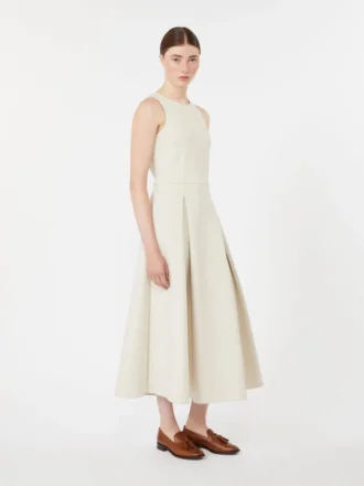 Lång, utställd klänning i scuba-jersey, beige