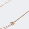 Långt halsband med monogramdetaljer, elfenben Långt halsband med monogramdetaljer, elfenben