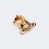 Metallbrosch med strass, guld