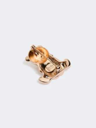 Metallbrosch med strass, guld