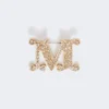 Monogrambrosch med kristaller, optiskt vit Monogrambrosch med kristaller, optiskt vit