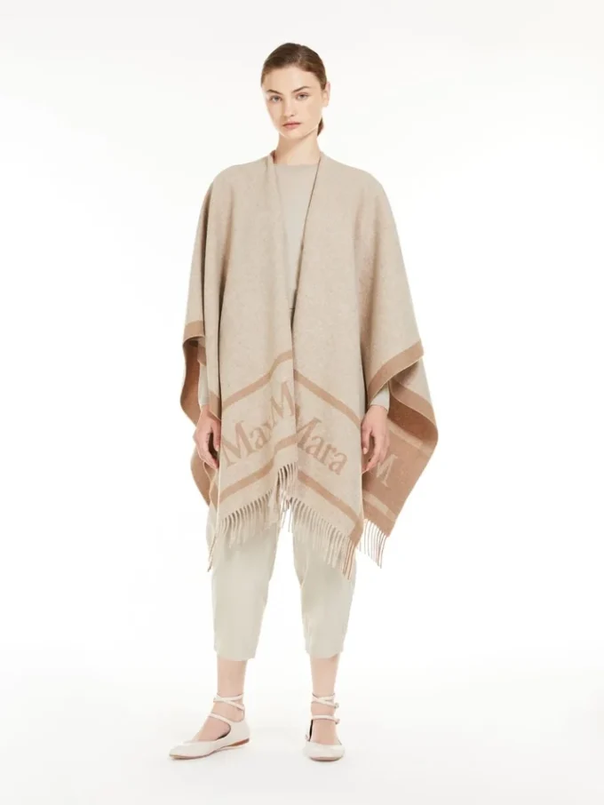 Poncho i jacquardull, beige Poncho i jacquardull, beige