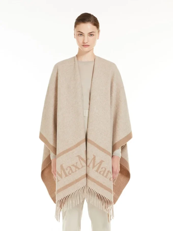Poncho i jacquardull, beige Poncho i jacquardull, beige