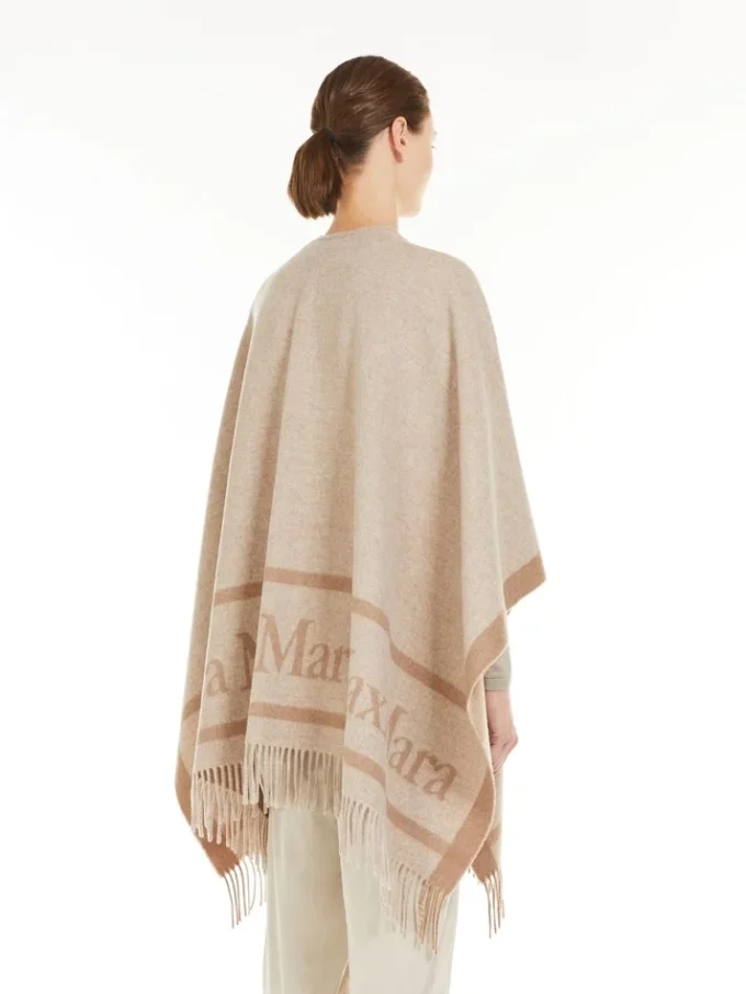 Poncho i jacquardull, beige Poncho i jacquardull, beige