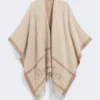 Poncho i jacquardull, beige Poncho i jacquardull, beige
