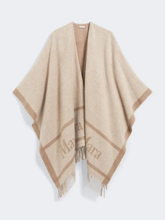Poncho i jacquardull, beige Poncho i jacquardull, beige