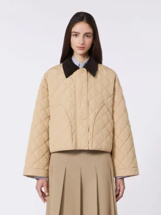 Vändbar vadderad jacka i vattenavvisande tyg, beige